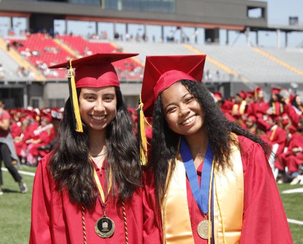 Saddleback graduates 2 females