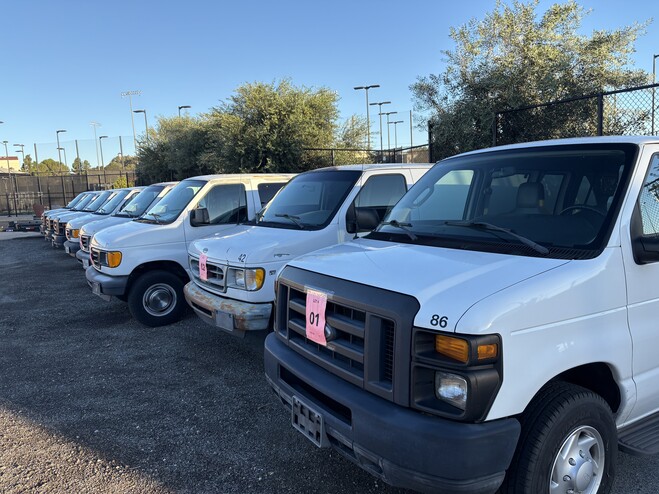 row of white vans