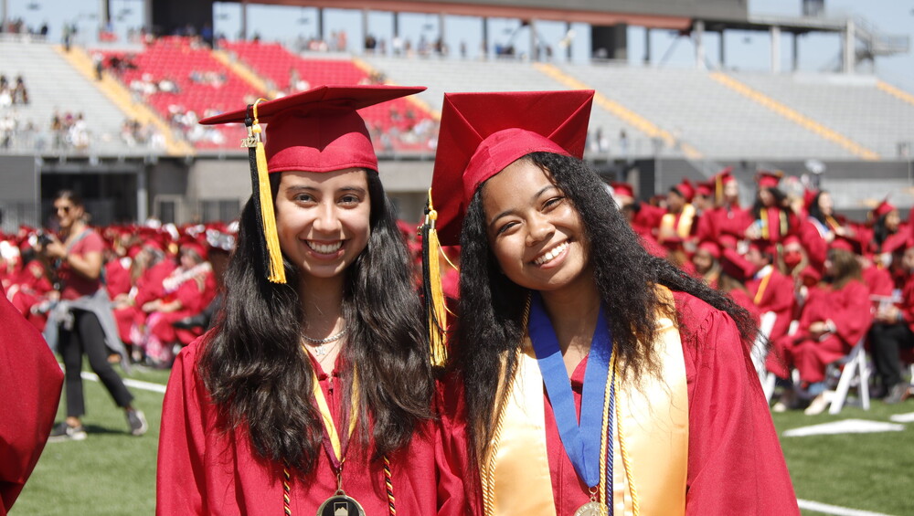 Saddleback graduates 2 females