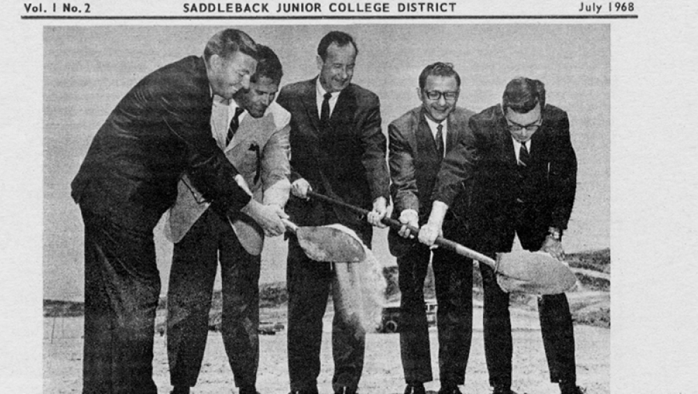 People holding shovels and digging