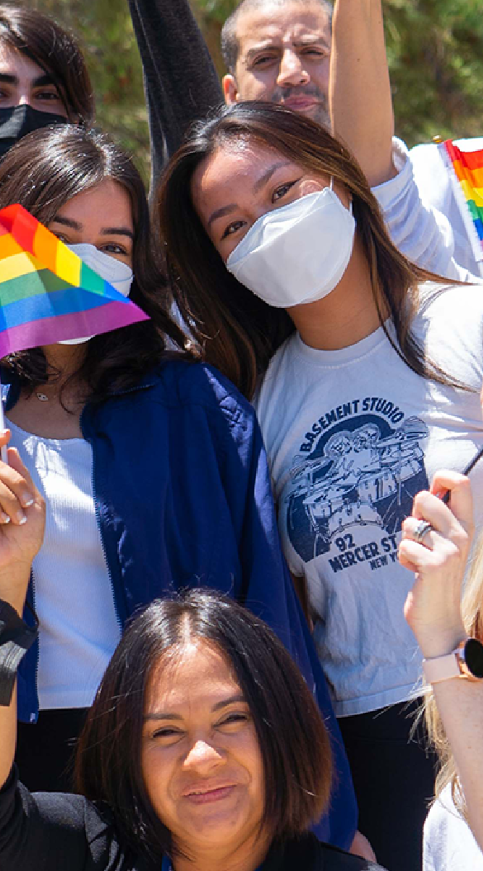 people holding pride flags