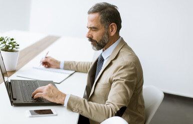 man using a laptop