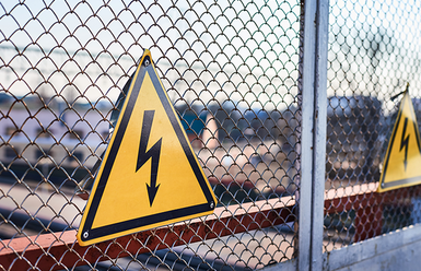 hazard sign on fence