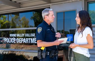 IVC pd officer talking to woman