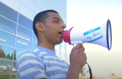 student holding a bull horn