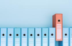 red and blue binders lined up