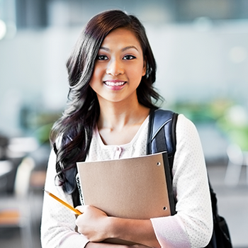 student holding binder