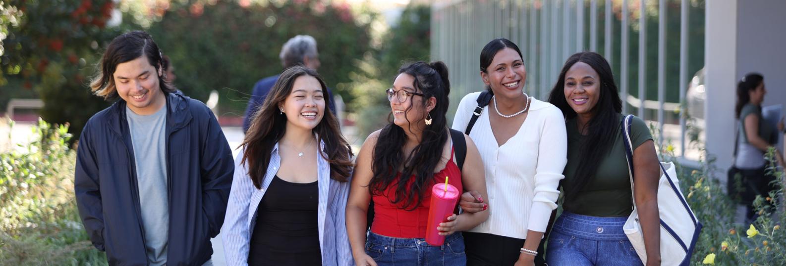 diverse students walking