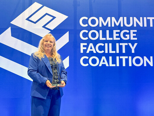 ann-marie gabel posing with award