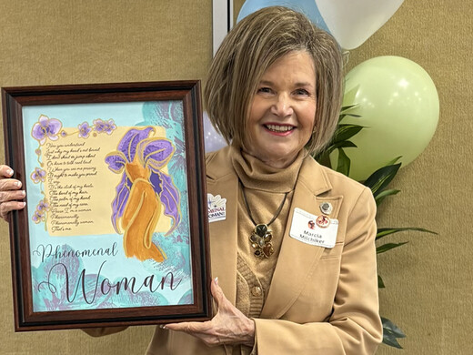 Marcia Milchiker accepting award