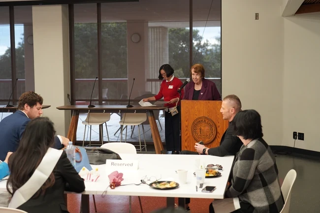 Trustee Carolyn Inmon speaks at spring opening