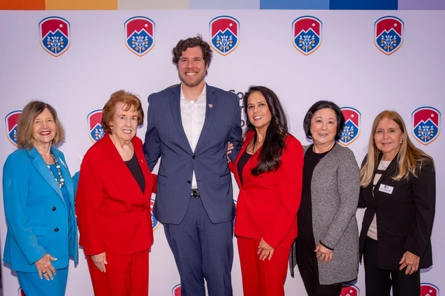 board members posing at state of the district event