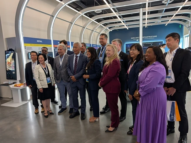 people pose for a photo at the Advantech opening