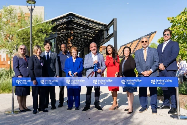 trustees and ivc admin cut the ribbon at the opening event
