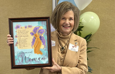 Marcia Milchiker accepting award