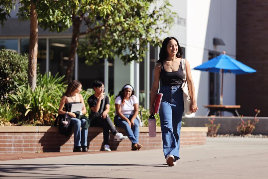 student walking on campus