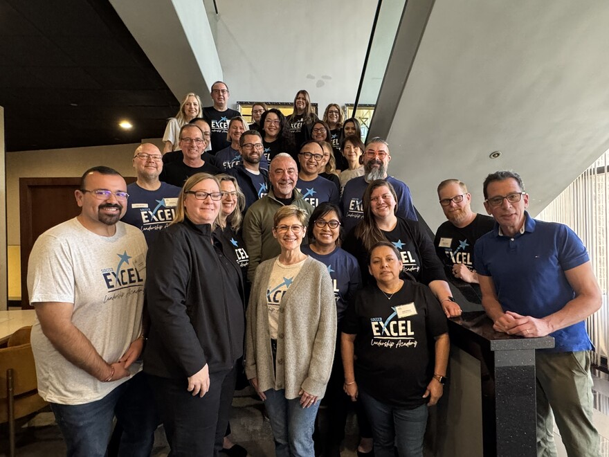 2025 cohort for Excel program; people standing